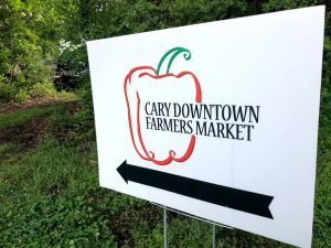 Sign pointing the way to Cary Downtown Farmers Market; photo by Kerry Mead
